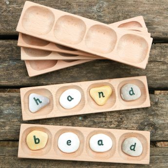 Blend and segment CVCC and CVVC words with this tactile wooden tray