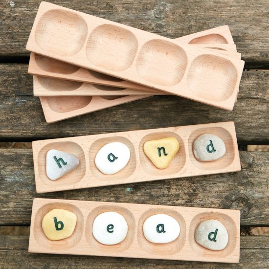 Blend and segment CVCC and CVVC words with this tactile wooden tray