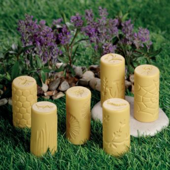 Set of 6 stone and resin rollers with garden designs