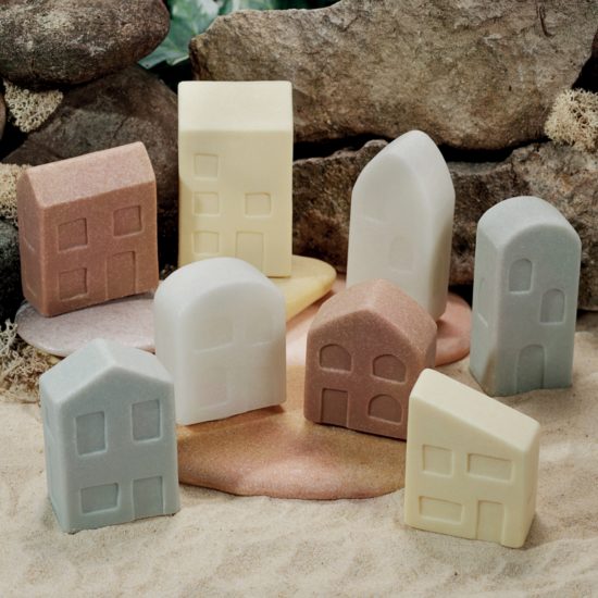 Set of 8 different houses made of stone and resin
