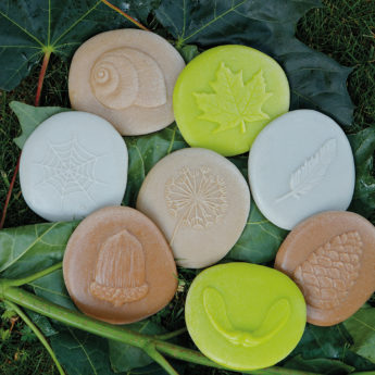 Eight nature-themed tactile stones