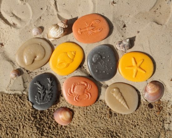 Set of eight ocean-themed stones made from a durable stone mix