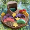 A collection of fairy tale-inspired play stones (toadstool, rainbow and star) made from a durable stone mix