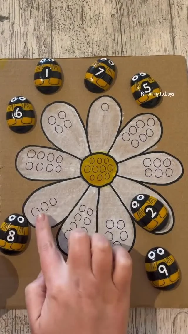 A wonderfully creative matching game by Mummy to boys — perfect for little learners, especially if you have our Honey Bee Number Stones! 🐝🌼

Here’s what they did ⬇️
Using our @yellow_door_education number bees, they created a flower from cardboard and decorated it with @littlebrianpaintsticks. Each petal had a number of dots, and the boys had to count the dots and match them to the correct numbered bee. 🐝🌸

Such a fantastic way to build early counting skills — and it really helped Mr 4 slow down and focus on one-to-one correspondence! 💛

Top tip: Use a wet paintbrush after applying @littlebrianpaintsticks to smooth the paint on cardboard — genius!

Resources used:
• @yellow_door_education number bees
• Cardboard (recycled!)
• @littlebrianpaintsticks

#earlyyearsmaths #eyfsactivities #eyfsinspiration #PlayToLearn #CountingSkills #MathsThroughPlay #numberrecognition #beemaths #yellowdooreducation #cardboardplay #recycleandplay #matchinggame #sensoryplayideas #loosepartsplay #learningthroughplay #earlyyearsideas #recycledcrafts #ecofriendlyplay